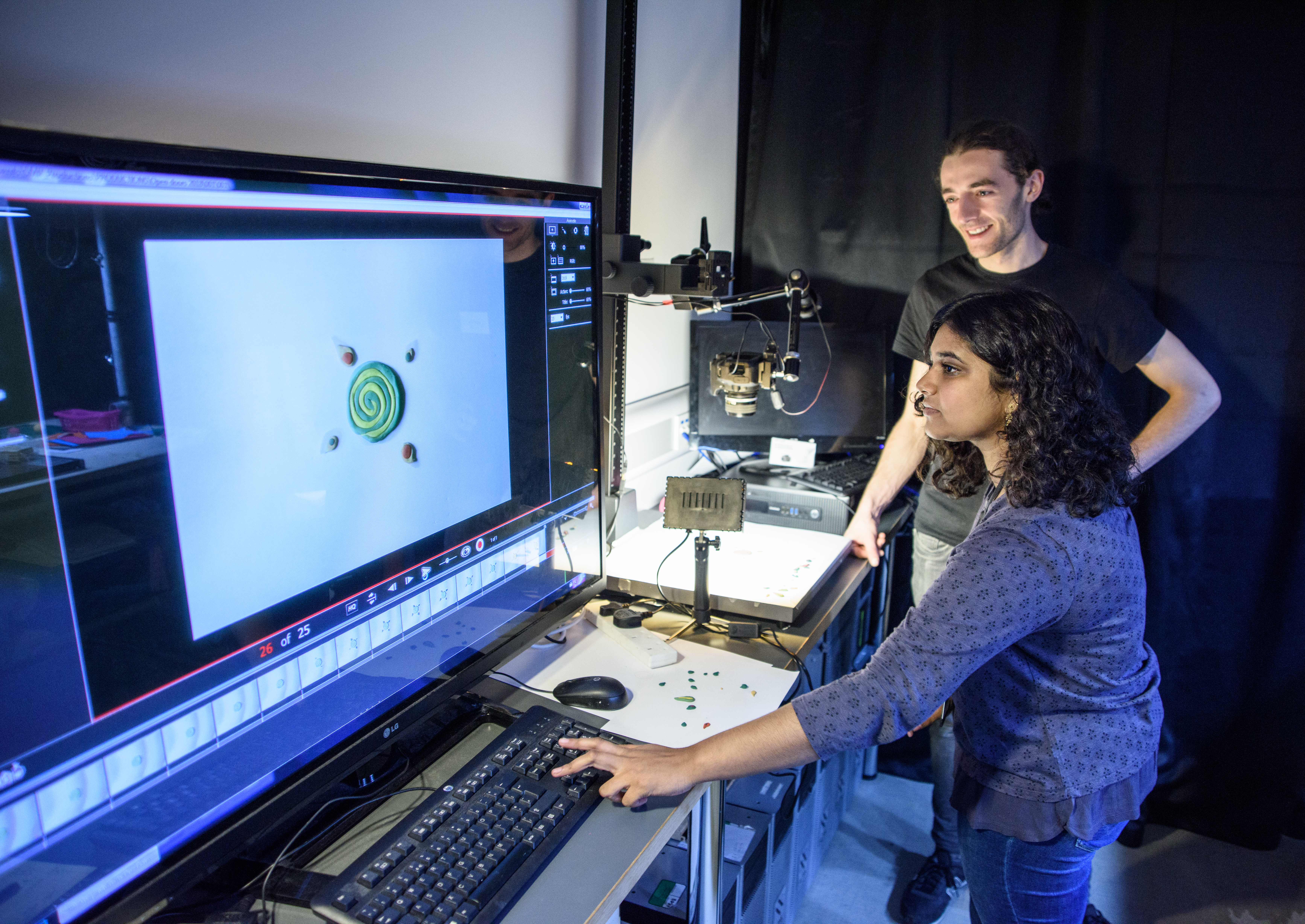 Woman and man using design software