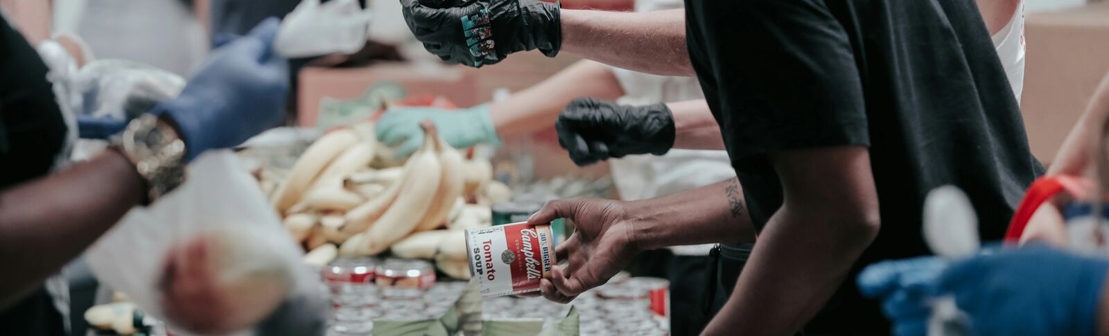 Volunteers handing over some food