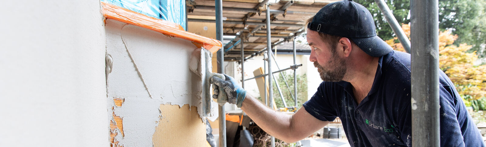 Person working on plastering