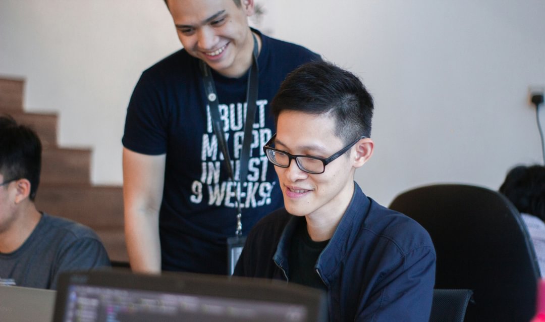 2 working on a computer