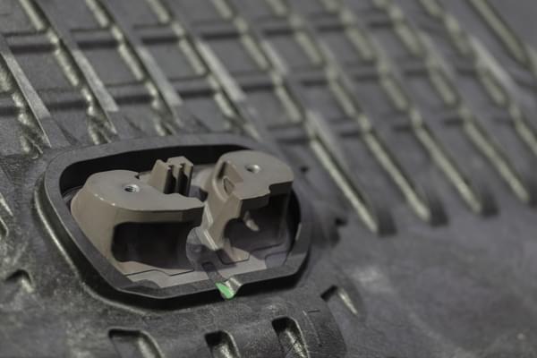 Overmolded engine mounts in a personal watercraft DLFT molded hull