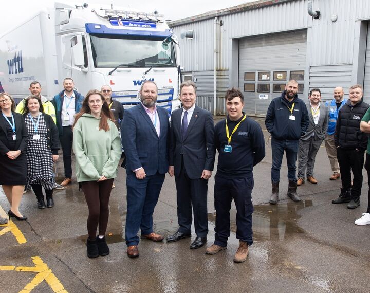 Dan Norris stands with HGV drivers who benefited from Skills Bootcamps