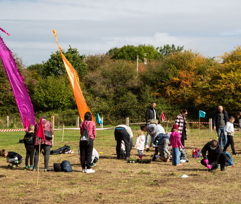 Group of people and flags outside