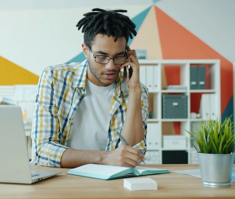 Young person working on laptop