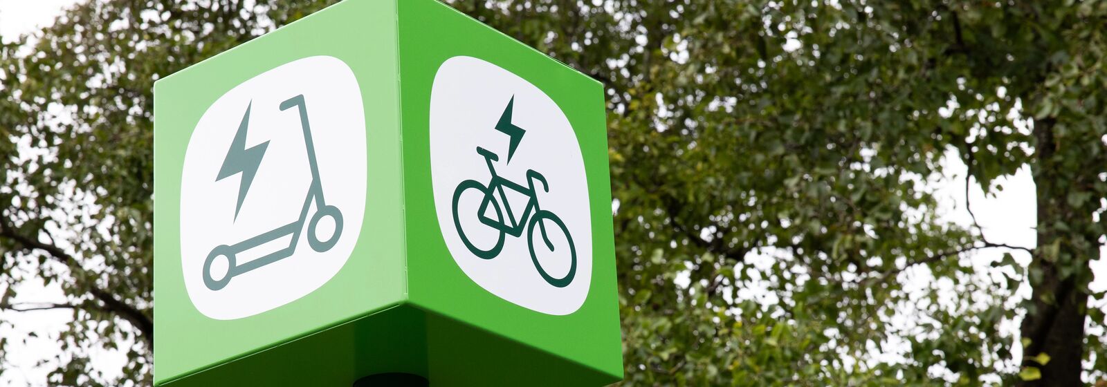 a scooter parking sign