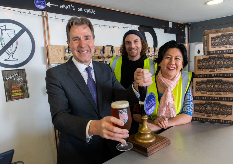 Metro Mayor Dan Norris pulls a pint at Moor Beer