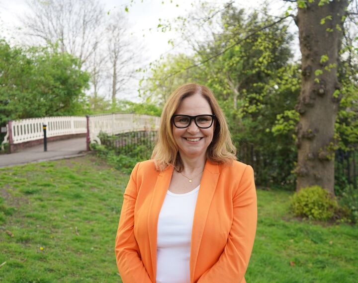 Mayor Helen Godwin in front of greenery