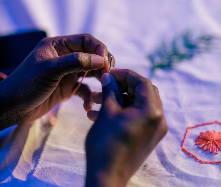 Hands sewing