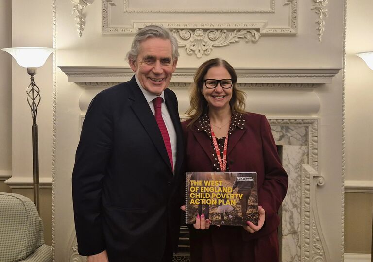 Mayor Helen Godwin with Gordon Brown, holding a copy of the child poverty action plan