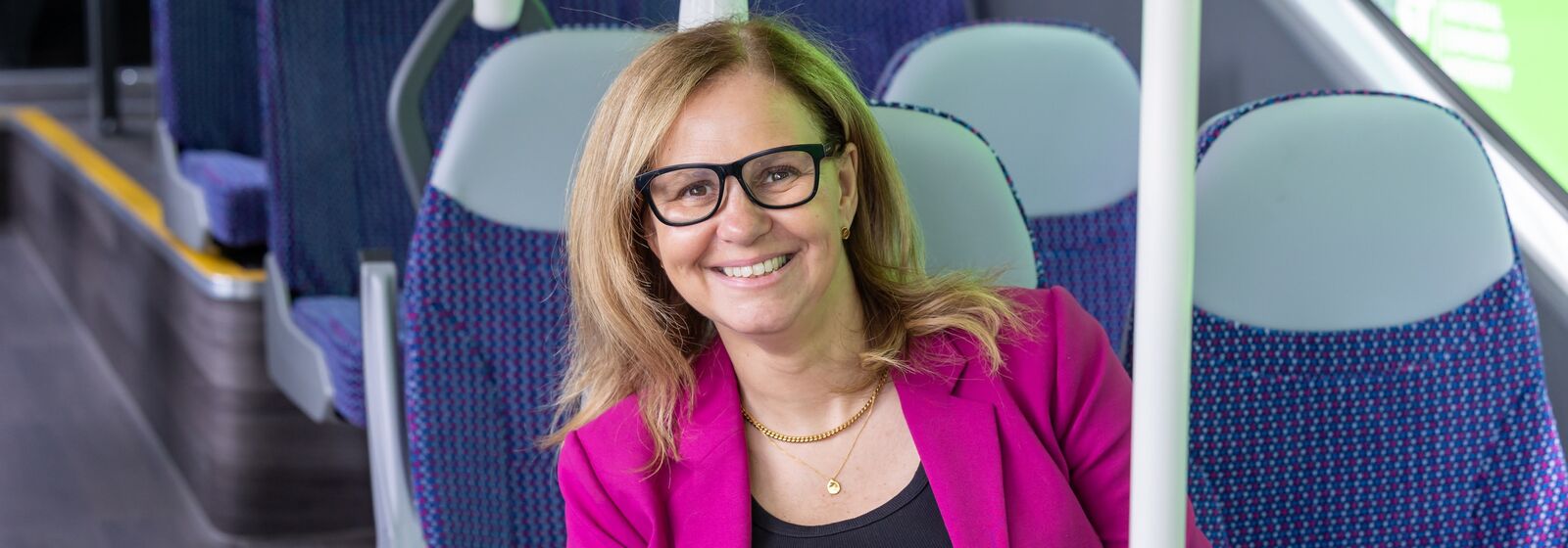 Helen Godwin, Mayor of the West of England, on a bus.