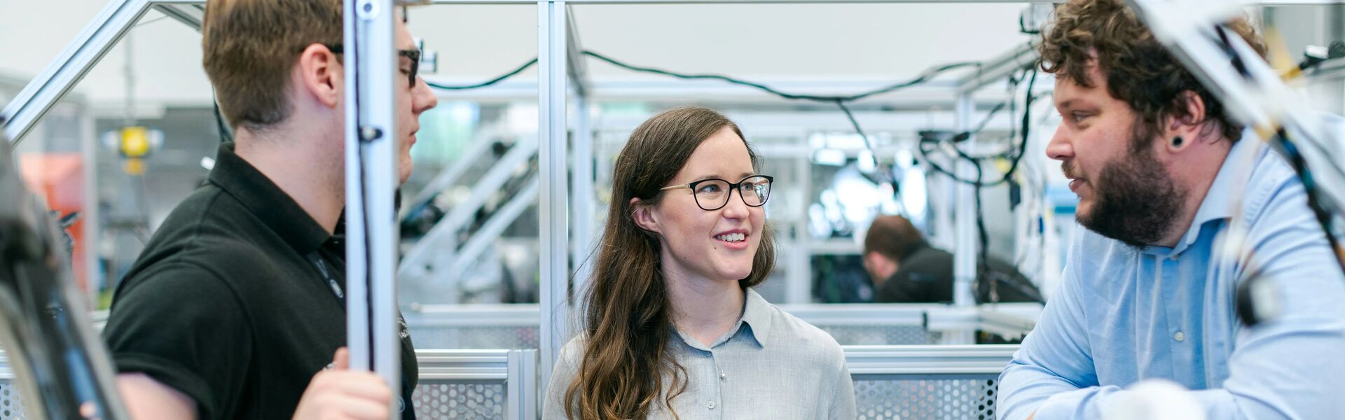 Three engineers working together