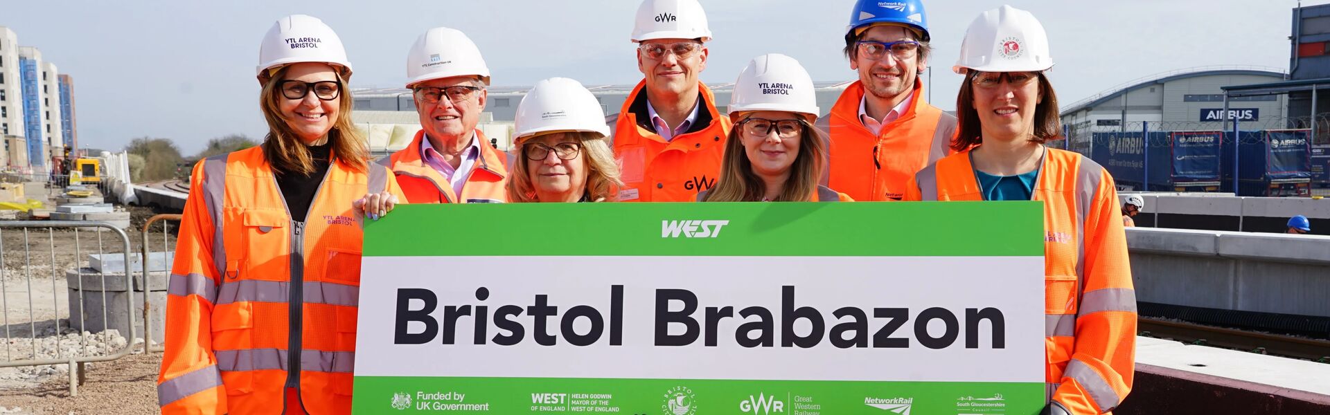 group photograph of people wearing PPE holding sign saying 'Bristol Brabazon'