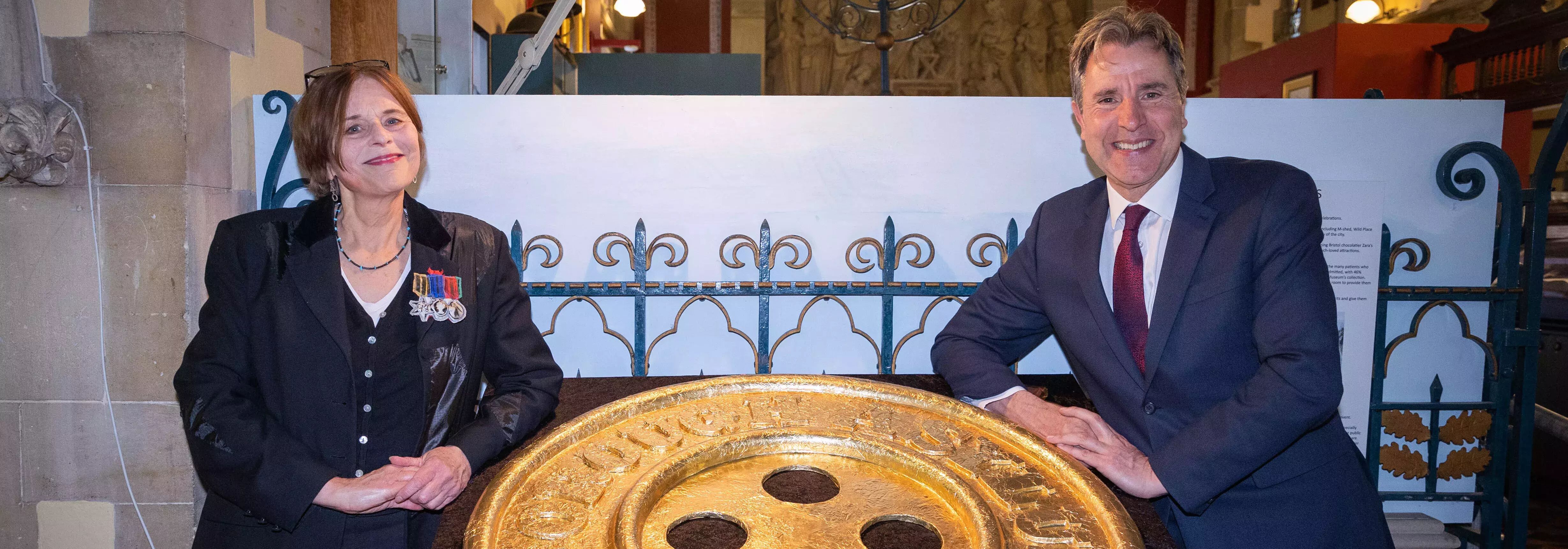 Dan with a giant chocolate button wrapped in gold foil