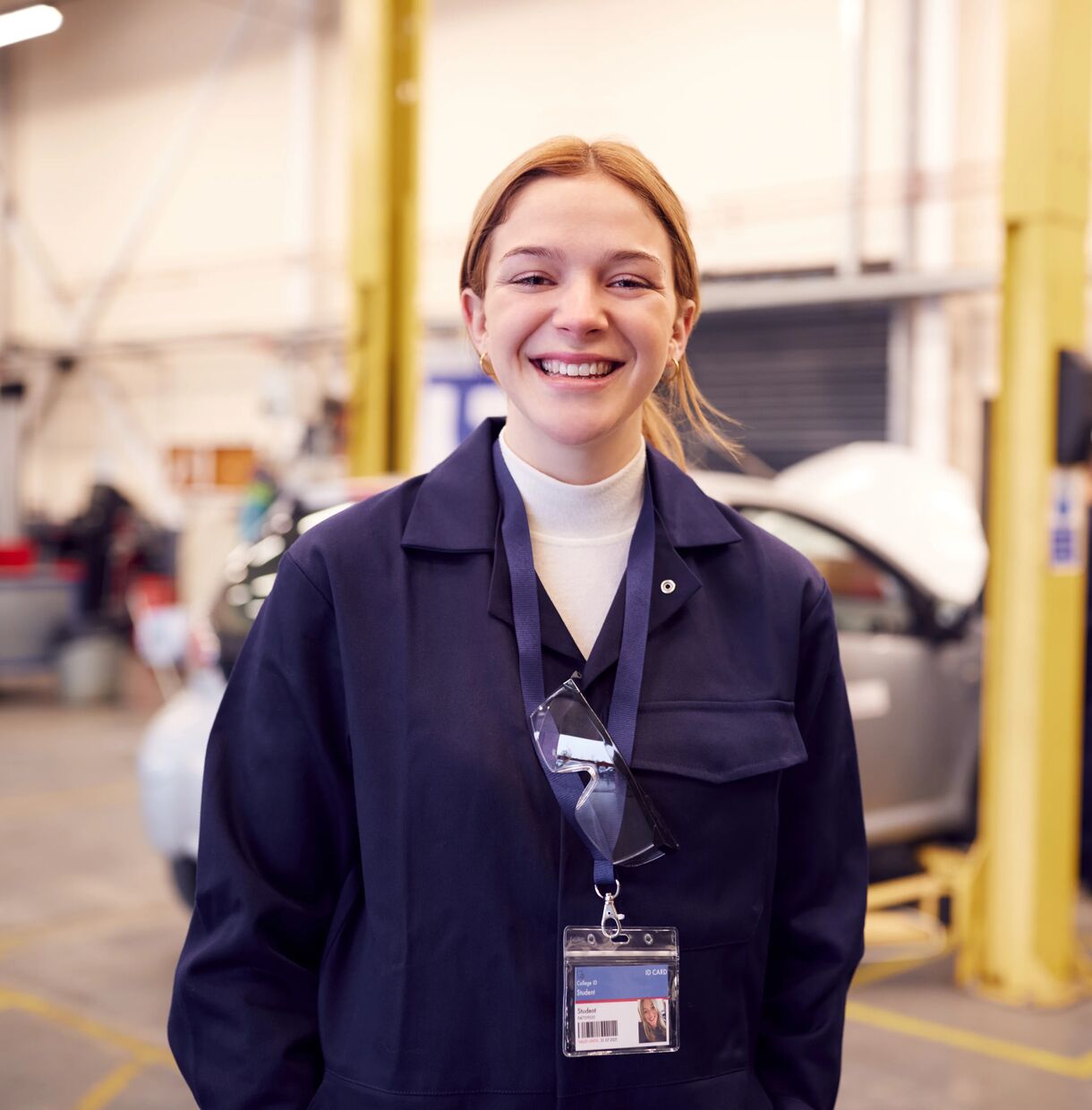 Young person in mechanic clothes