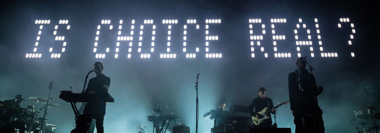 Massive Attack are pictured performing on Bristol Downs in 2024