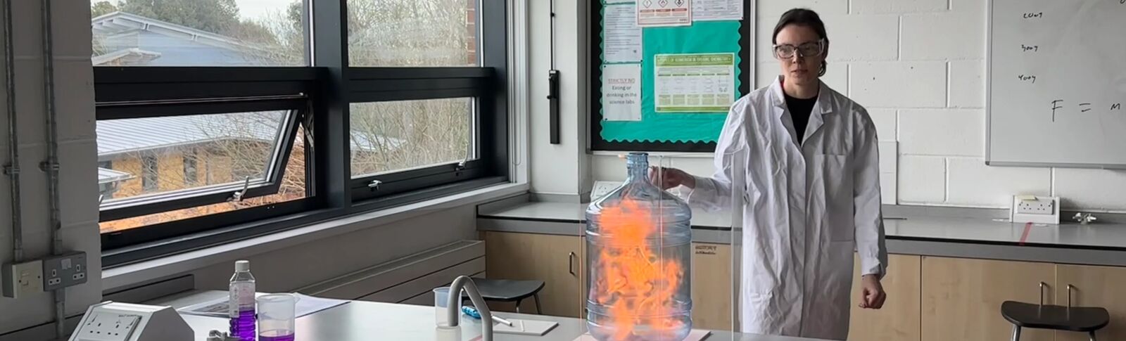 Person teaching science experiment