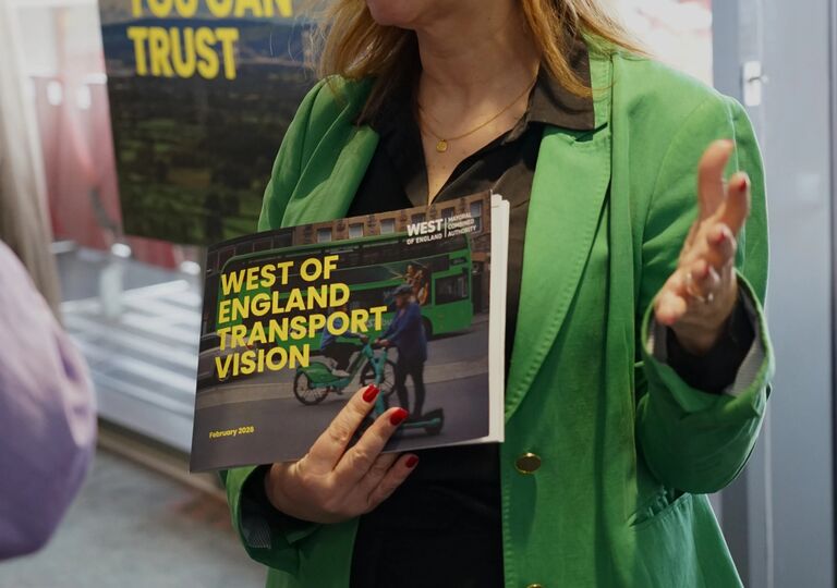 Mayor Helen Godwin holding a copy of the Transport Vision
