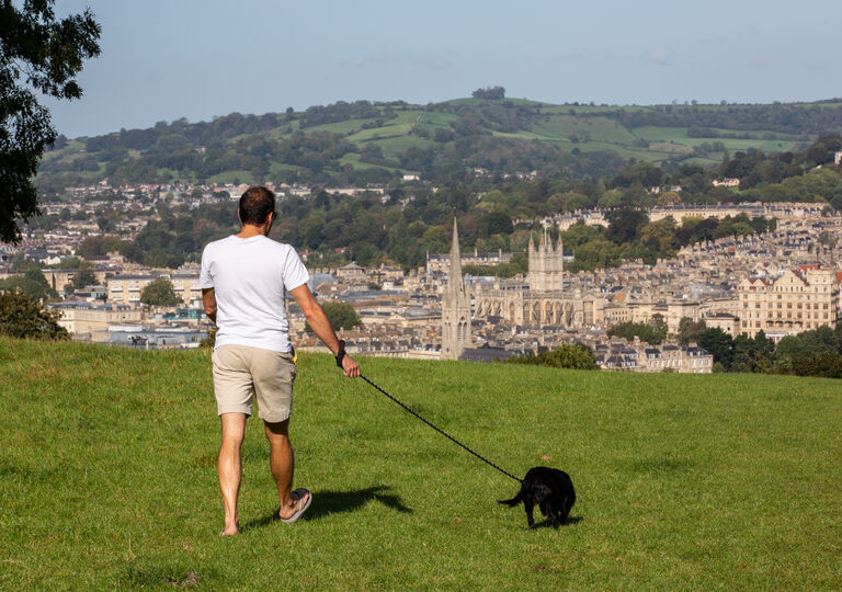Man walking his dog in Bath