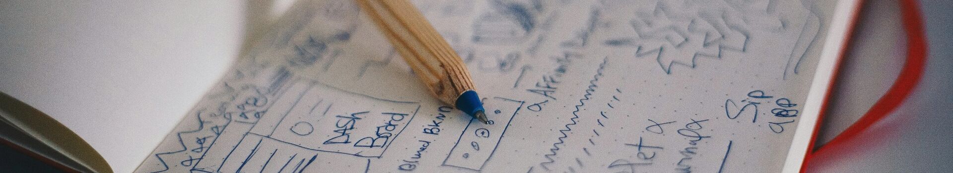 Notepad with wireframes on