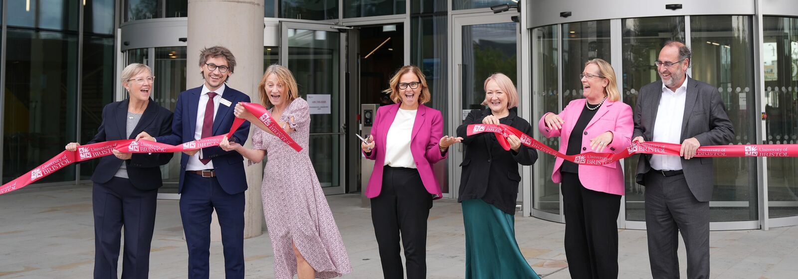 the mayor and partners cutting a red ribbon to open the new university of bristol campus