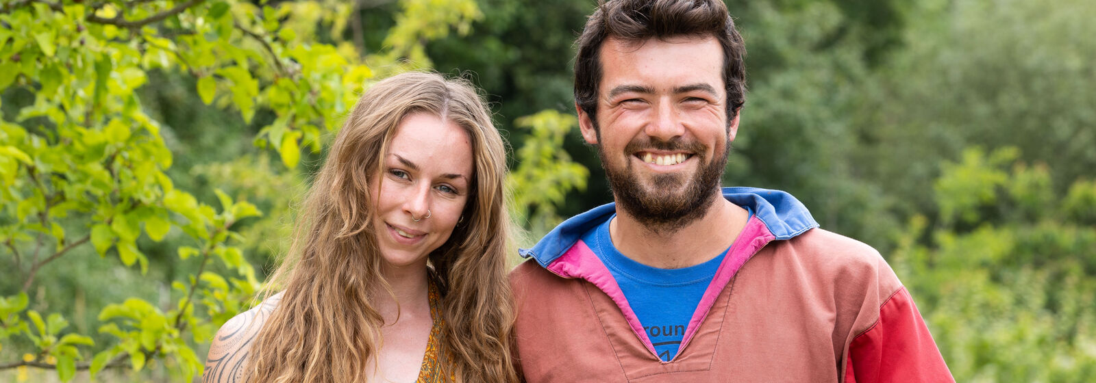 Smiling farm owners