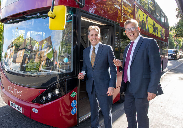 Metro Mayor Dan Norris and Doug Claringbold, MD of First Bus launch the Tap On, Tap Off fare capping scheme