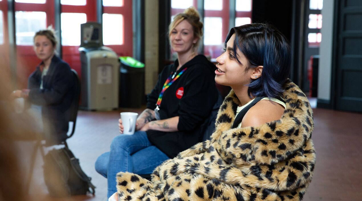 Young person talking at a careers event