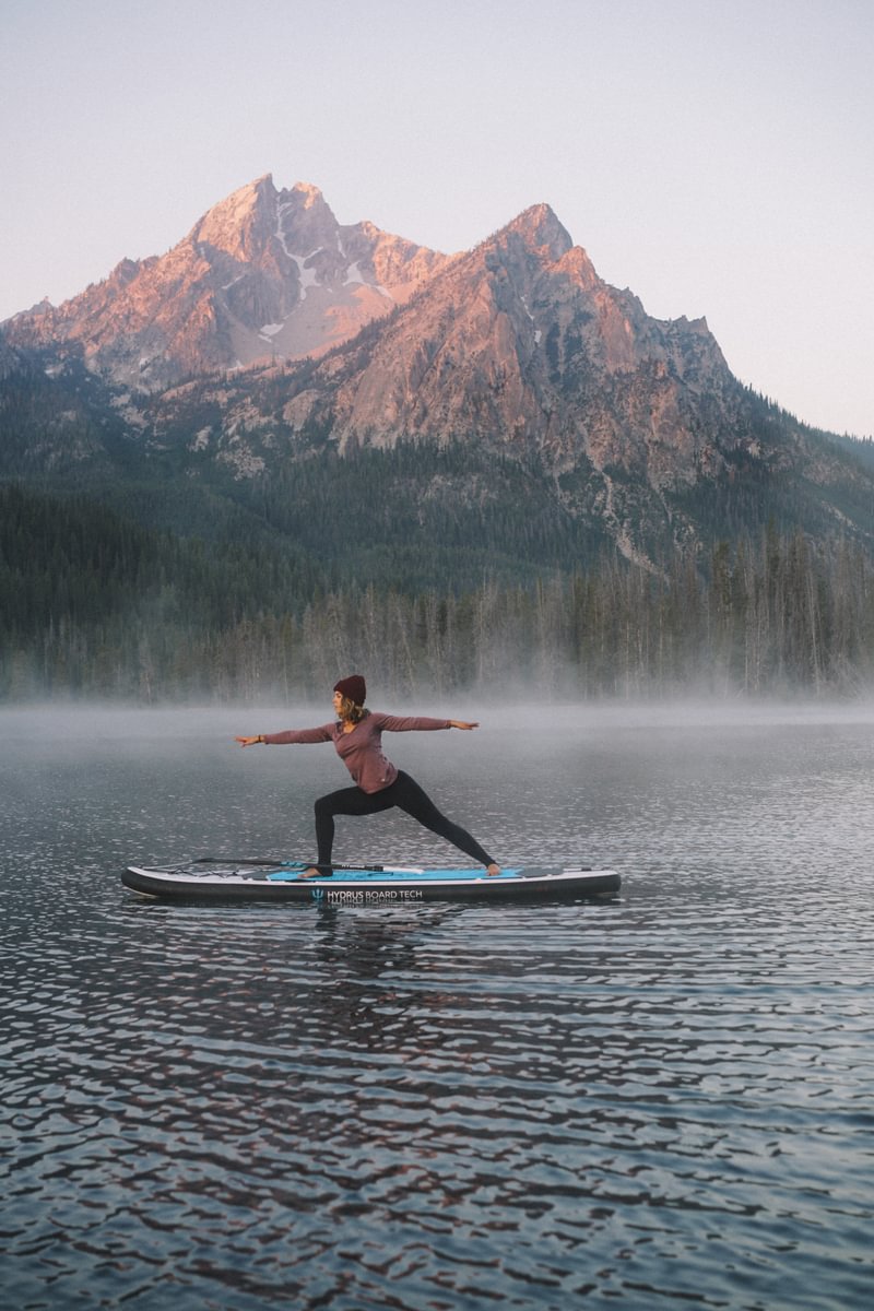 Yoga on paddleboard warrior 2