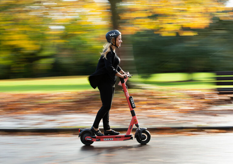 Person riding scooter