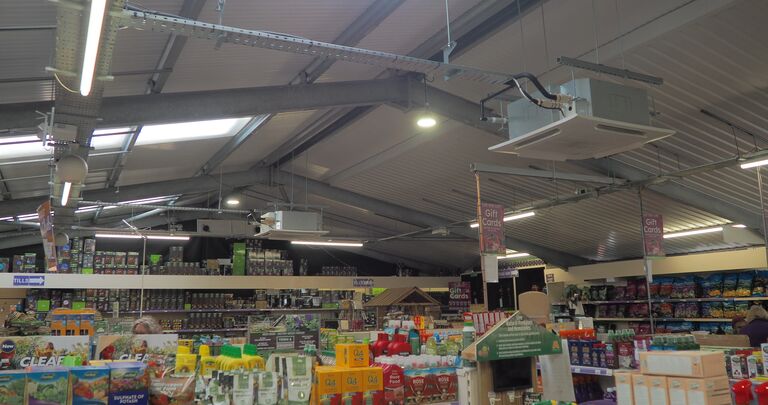 wider view of the interior roof, with supported air conditioning units and lighting