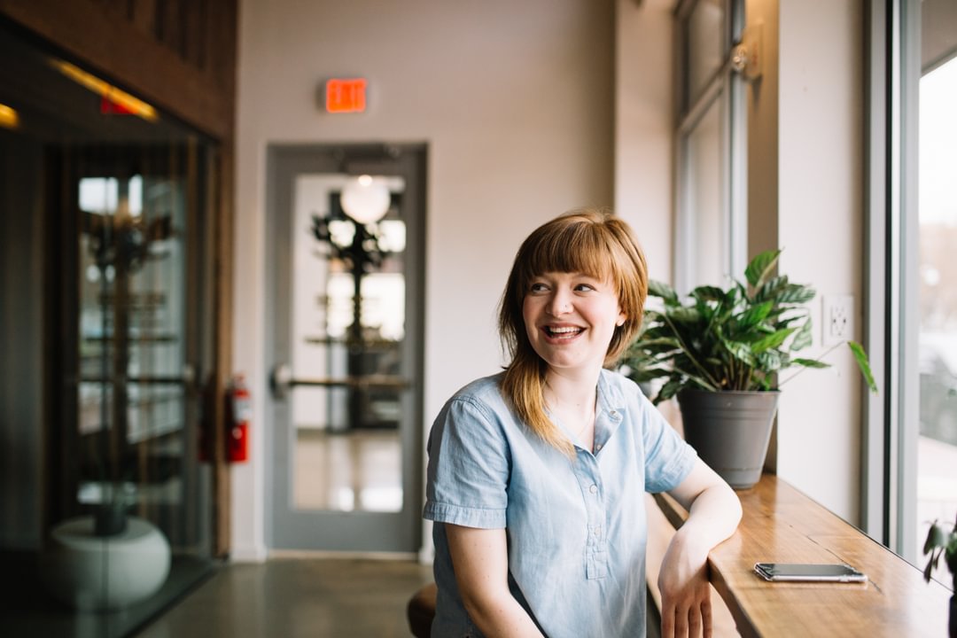 Smiling person in cafe