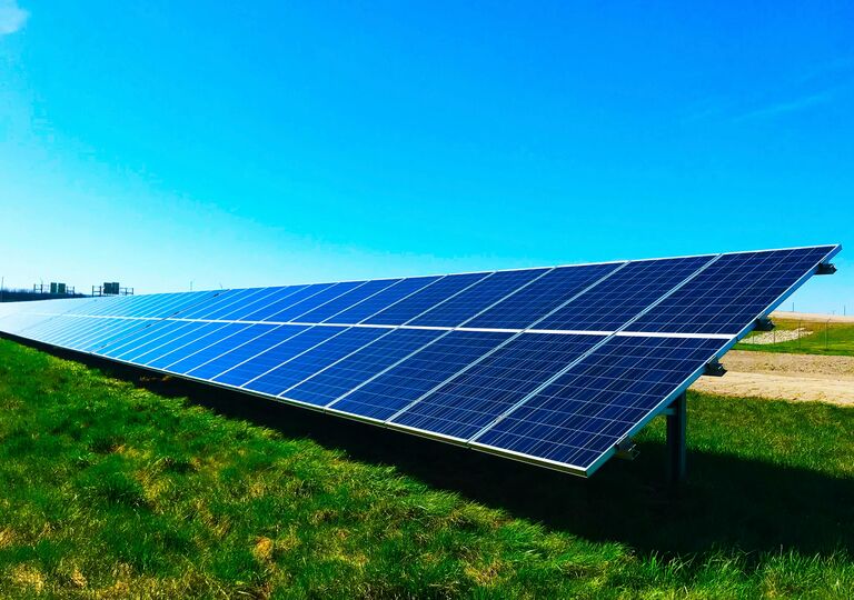solar panels against blue sky