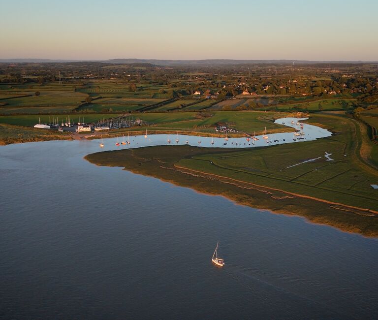 Estuary habitat in sunshine, from above