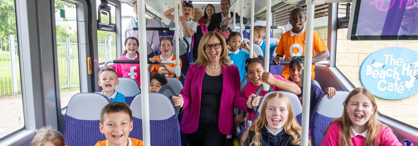 Mayor Helen Godwin and children celebrate Kids go Free