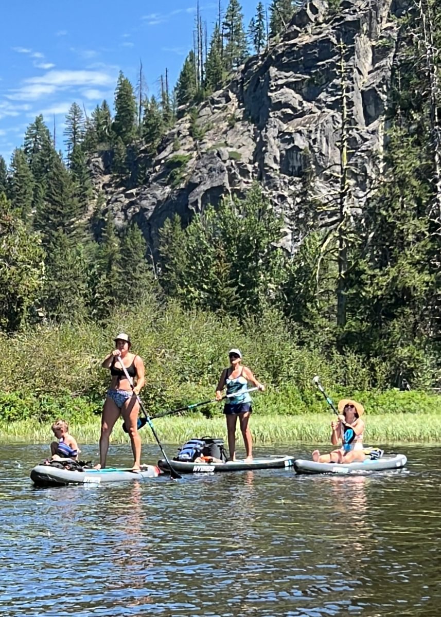 family paddleboarding