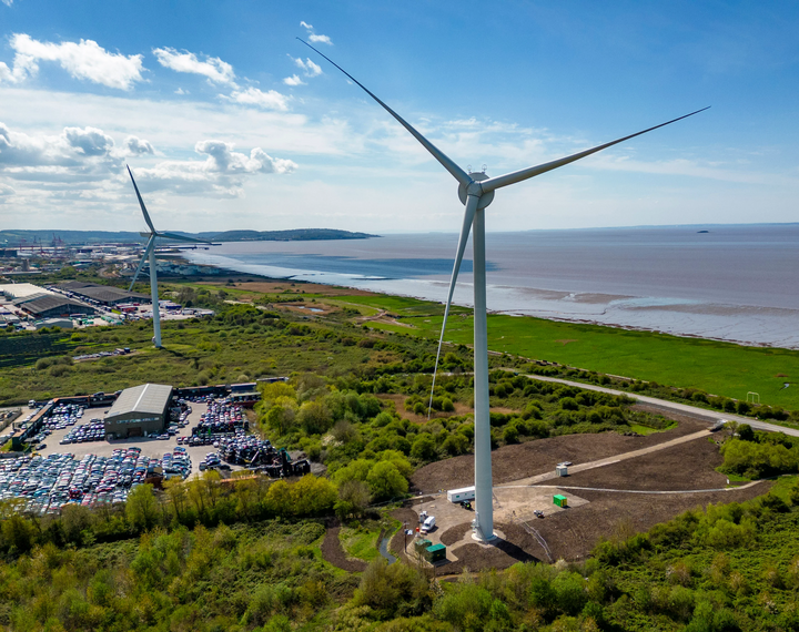 Wind turbines are pictured, alongside the Severn Estuary/Bristol Channel.