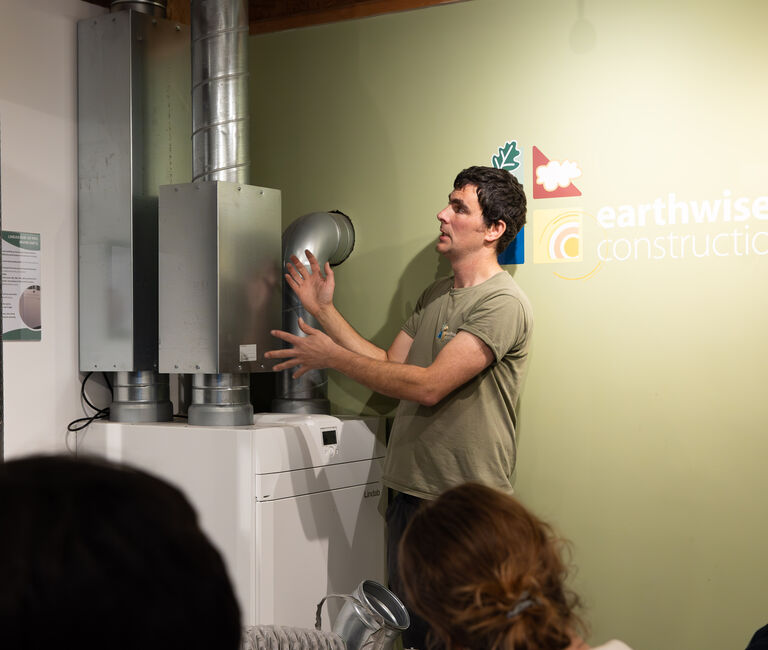 Person teaching about boil;ers