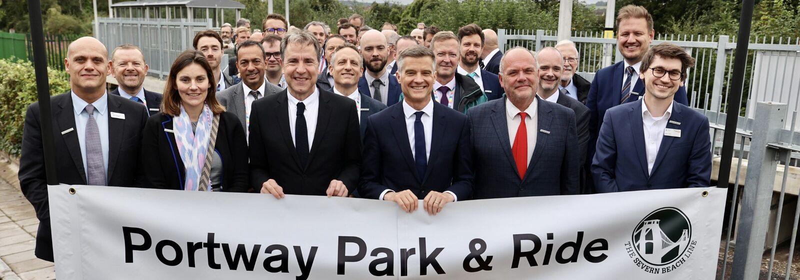 Group stand behind portway P&R sign