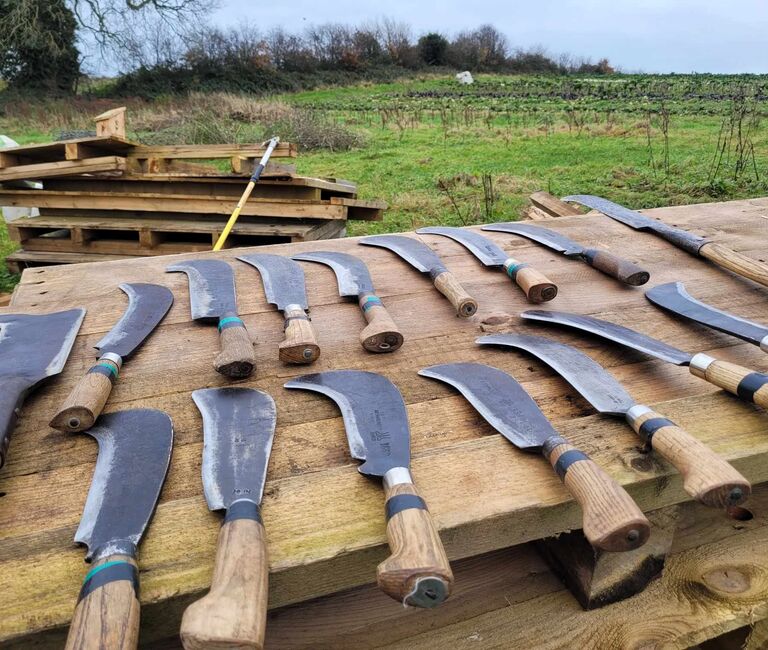 Table with bladed tools