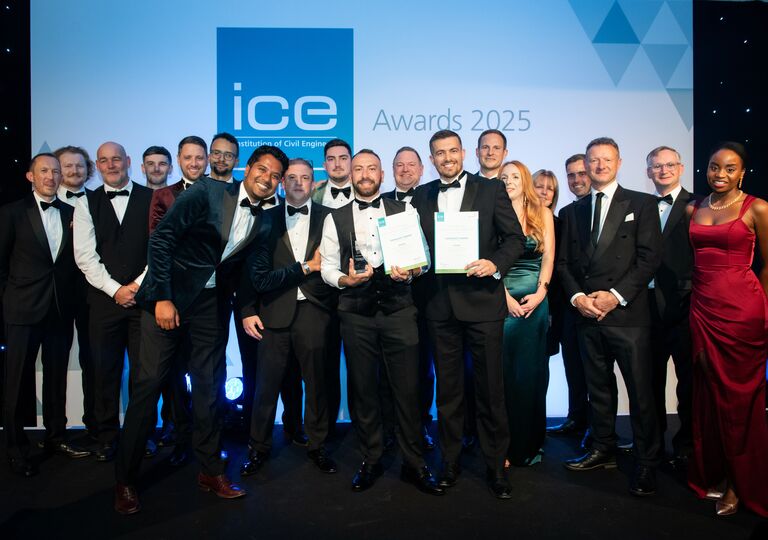 team celebrates winning prize