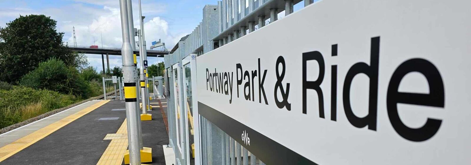 Portway Park and Ride sign at a train station