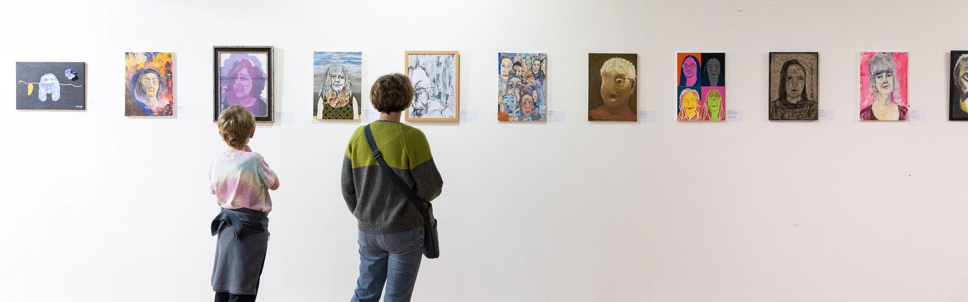 People looking at art in a gallery