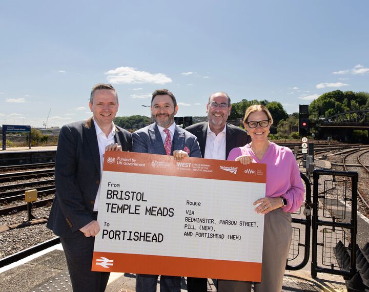 Image of 4 people, including the Mayor, holding up a giant train ticket for Portishead station