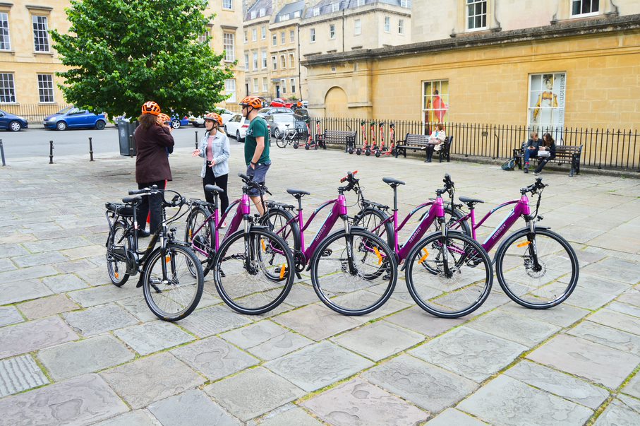 Cyclists with Julian House e-bikes in Bath