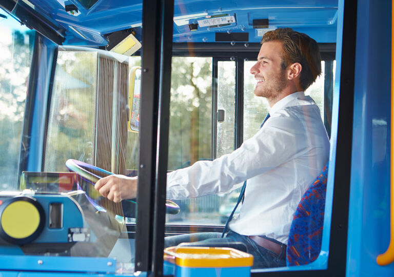 Man driving a bus