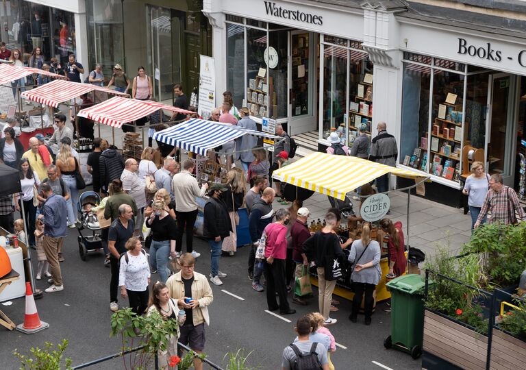 busy market stalls in milsom street, bath