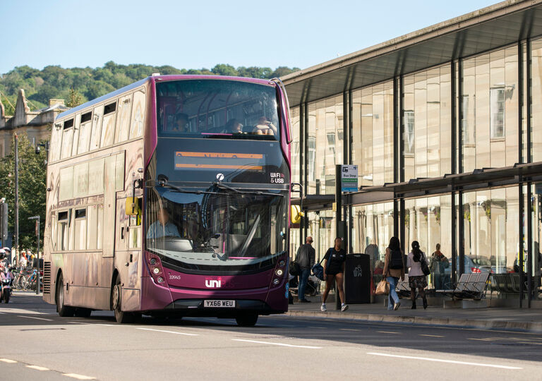 Bus driving in street