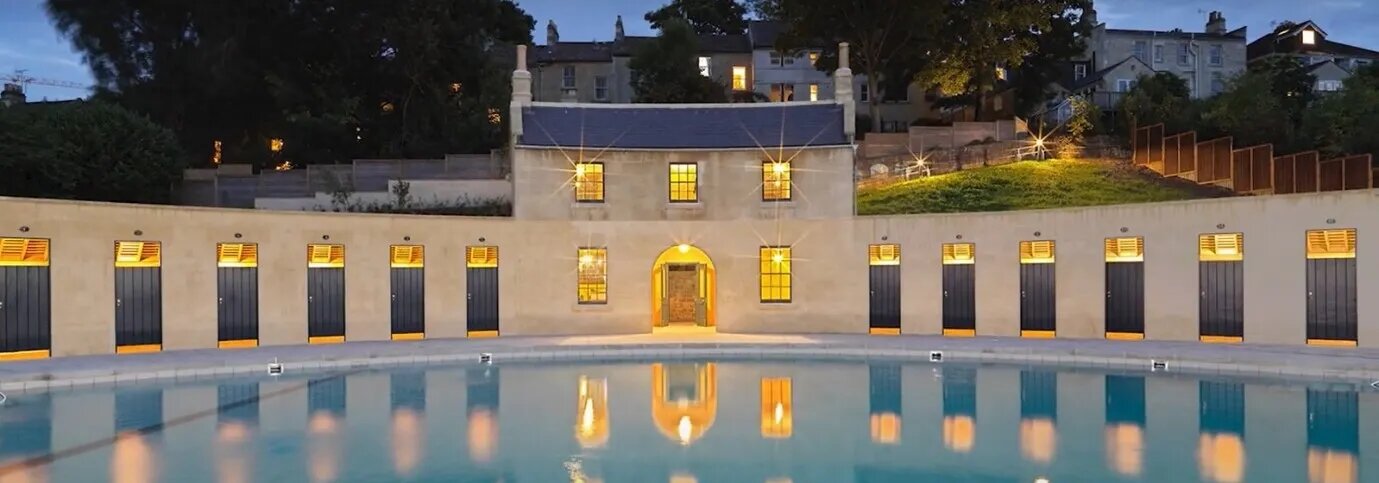 Pool and stone building