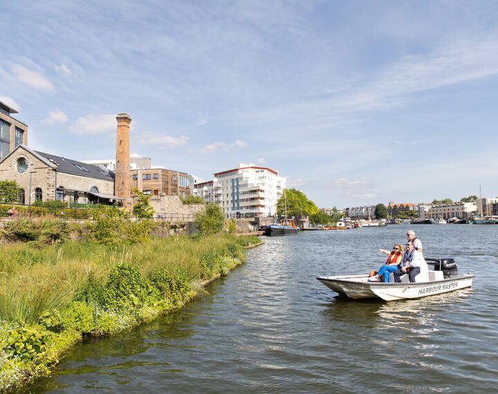 Helen Godwin, the new Mayor of the West of England, and Councillor Tony Dyer, the Leader of Bristol City Council, are pictured on the Harbour Master's boat, looking at the floating habitat at Capricorn Quay, Bristol Harbour.