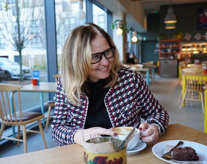Mayor Helen Godwin smiling in a cafe
